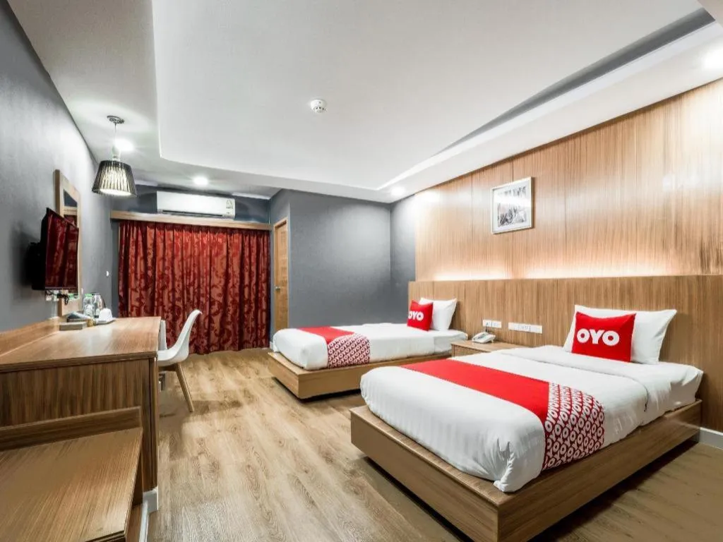 Bed in OYO 1126 Curve Boutique Pattaya