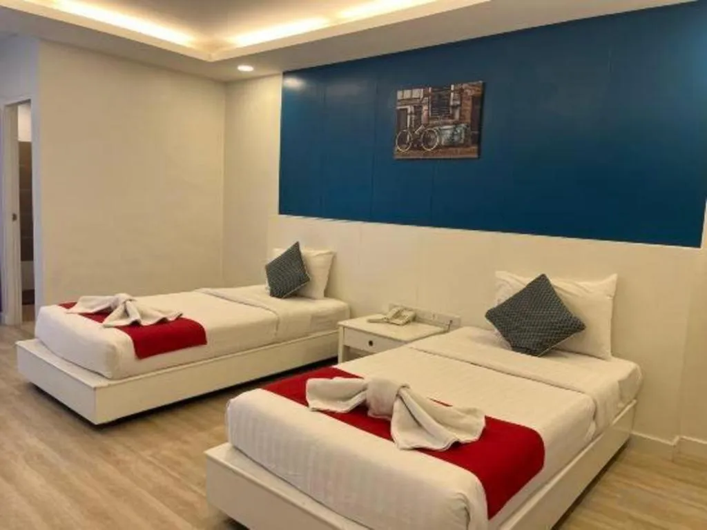 Bed in OYO 1126 Curve Boutique Pattaya