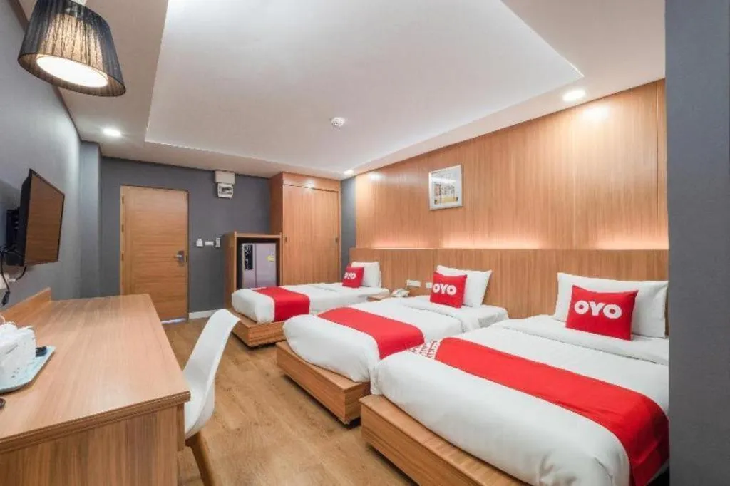 Bed in OYO 1126 Curve Boutique Pattaya