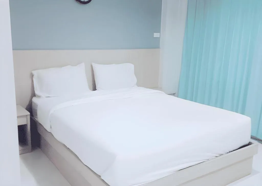 Bed in Grand PL Hotel