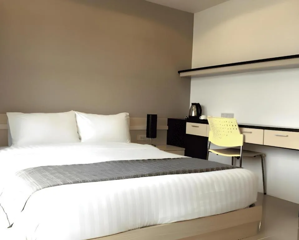 Bed in Grand PL Hotel