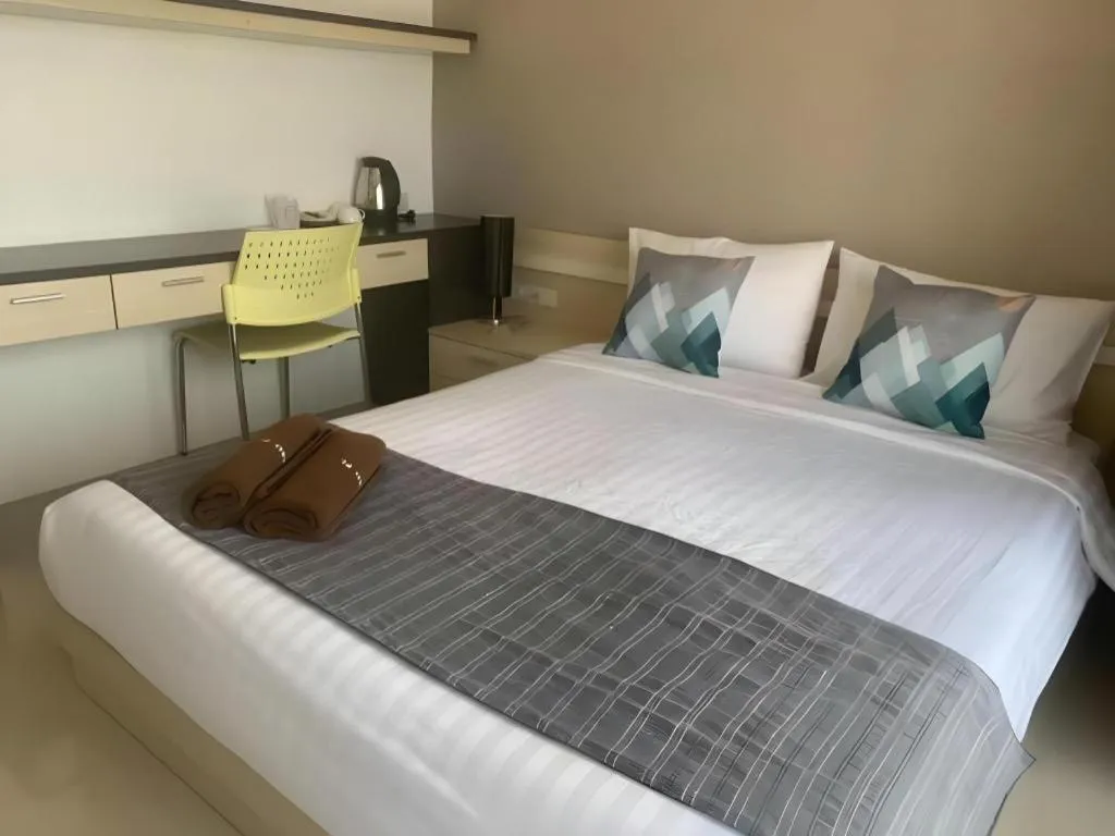 Bed in Grand PL Hotel