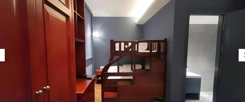 Bed in Yitingzhenshe Hotel Beijing Qianmen