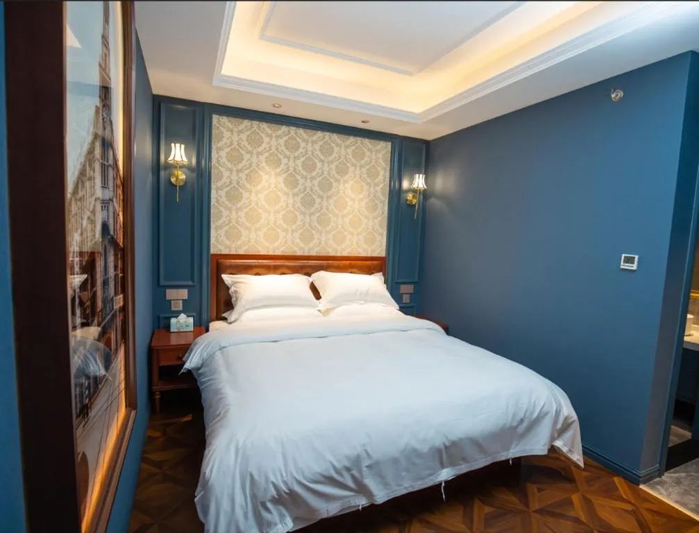 Bed in Yitingzhenshe Hotel Beijing Qianmen