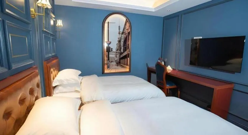 Bed in Yitingzhenshe Hotel Beijing Qianmen