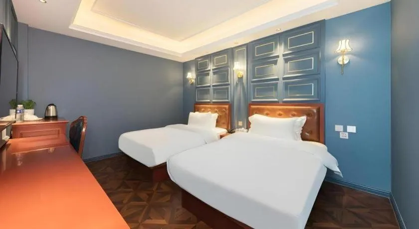 Bed in Yitingzhenshe Hotel Beijing Qianmen