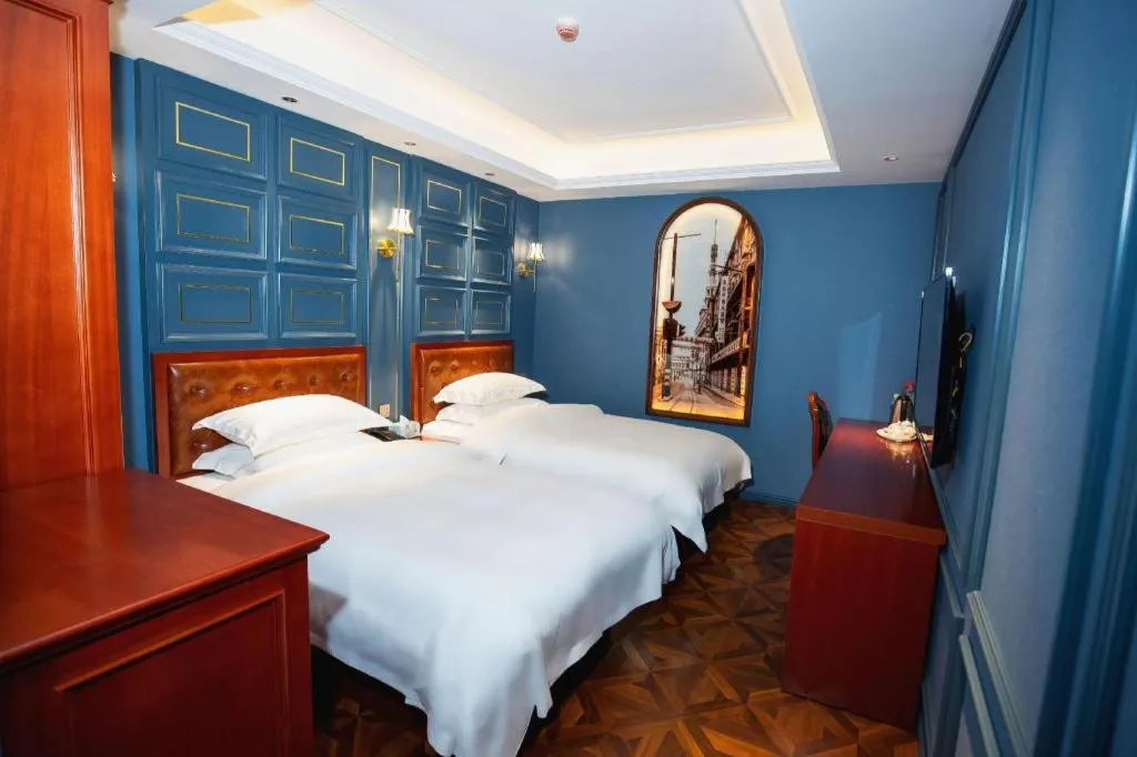 Bed in Yitingzhenshe Hotel Beijing Qianmen