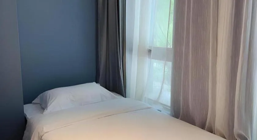 Bed in Yitingzhenshe Hotel Beijing Qianmen