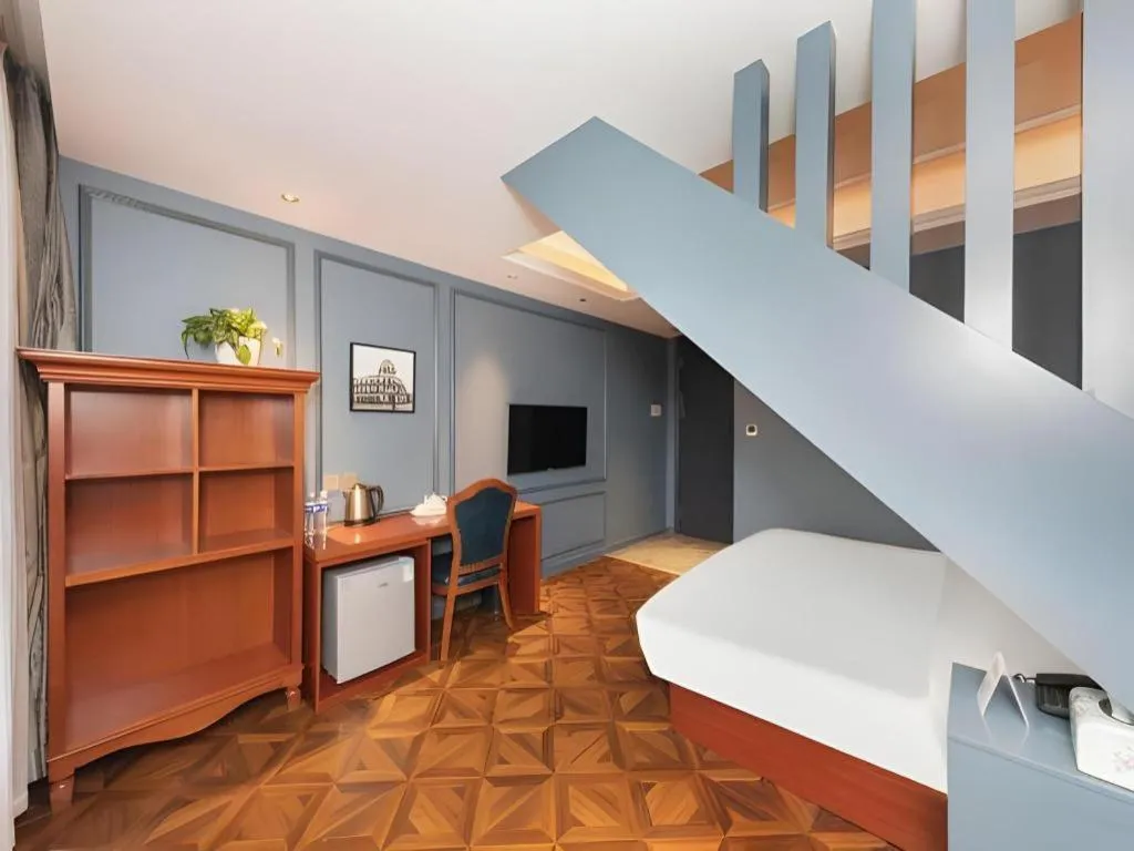 Bed in Yitingzhenshe Hotel Beijing Qianmen