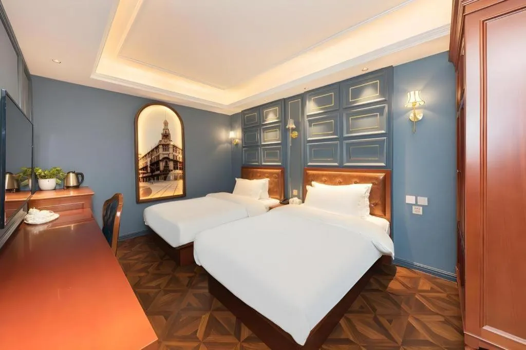 Bed in Yitingzhenshe Hotel Beijing Qianmen