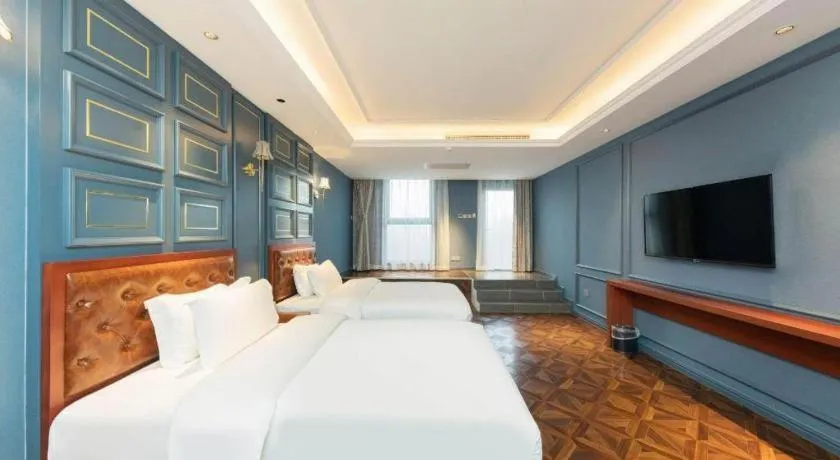 Bed in Yitingzhenshe Hotel Beijing Qianmen