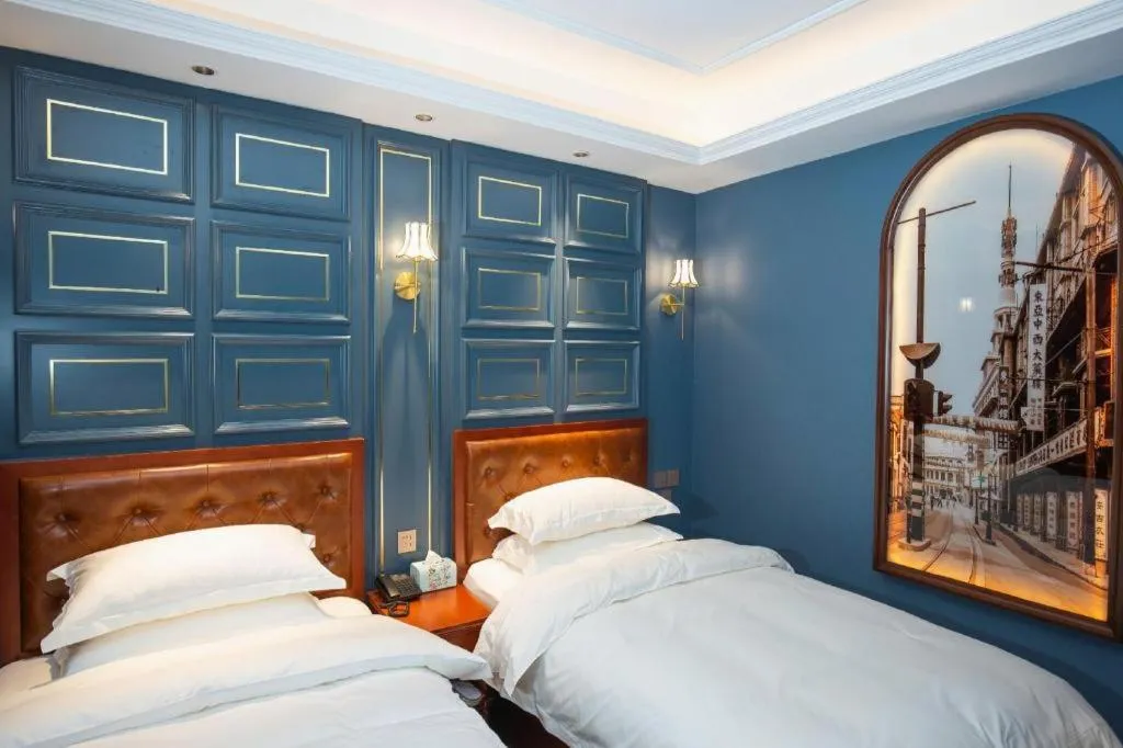 Bed in Yitingzhenshe Hotel Beijing Qianmen