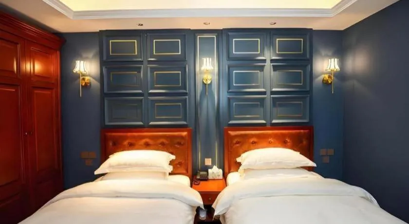 Bed in Yitingzhenshe Hotel Beijing Qianmen