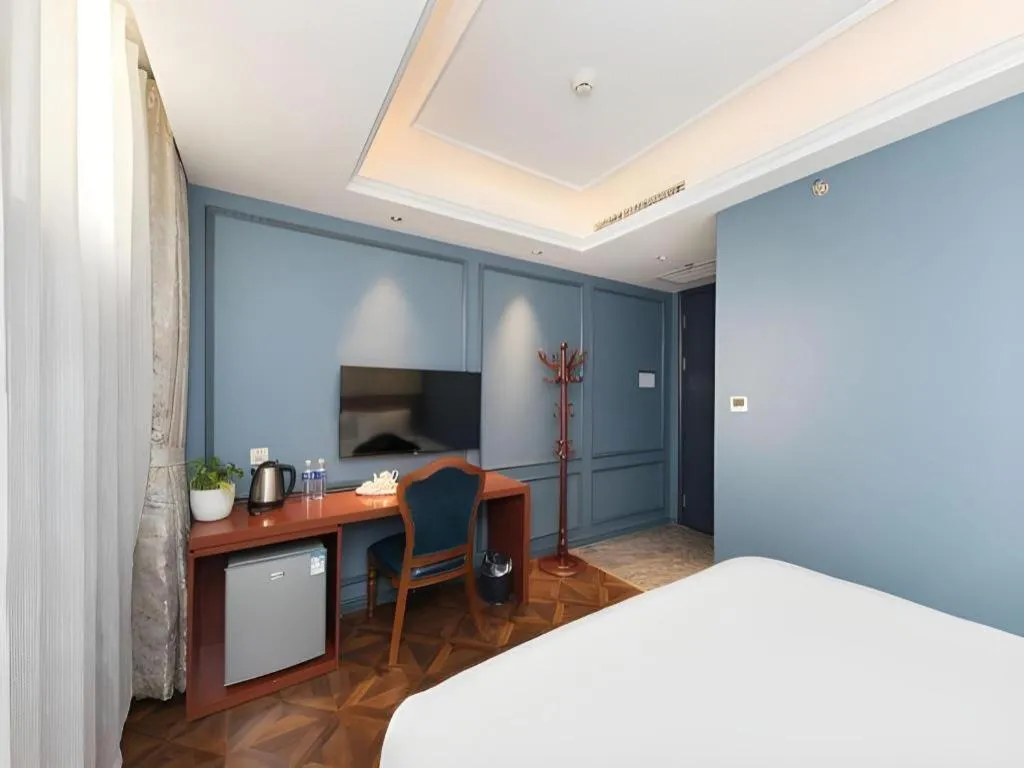 Bed in Yitingzhenshe Hotel Beijing Qianmen