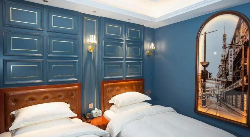 Bed in Yitingzhenshe Hotel Beijing Qianmen