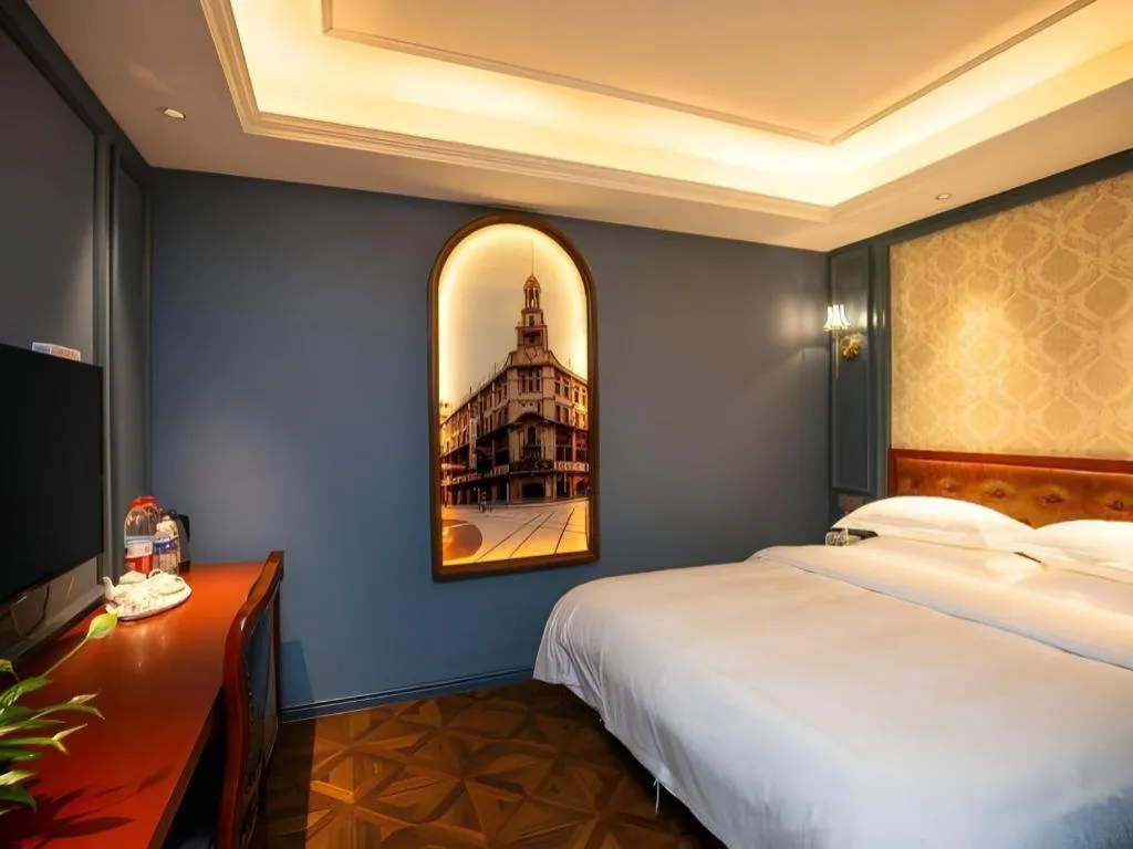 Bed in Yitingzhenshe Hotel Beijing Qianmen