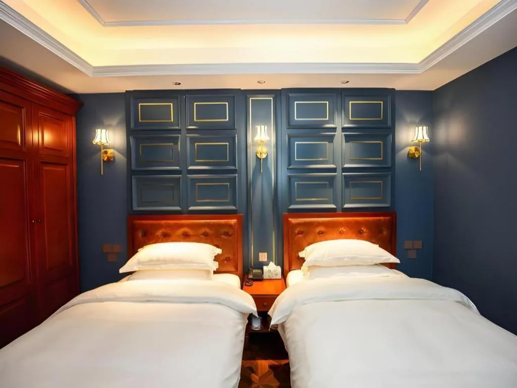 Bed in Yitingzhenshe Hotel Beijing Qianmen