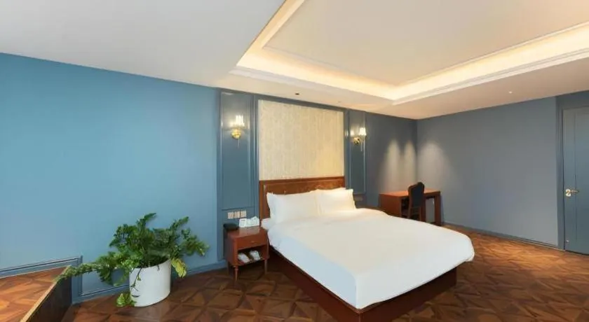 Bed in Yitingzhenshe Hotel Beijing Qianmen