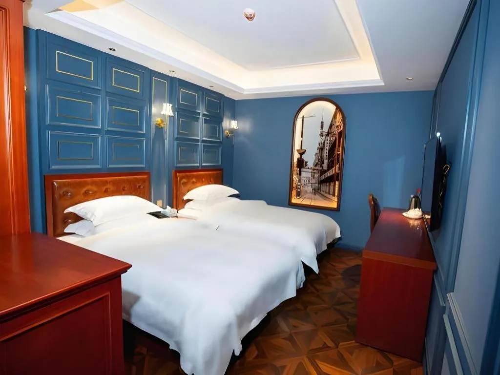 Bed in Yitingzhenshe Hotel Beijing Qianmen