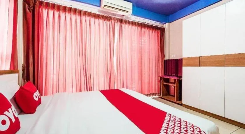 Bed in OYO 826 Cozy Rooms