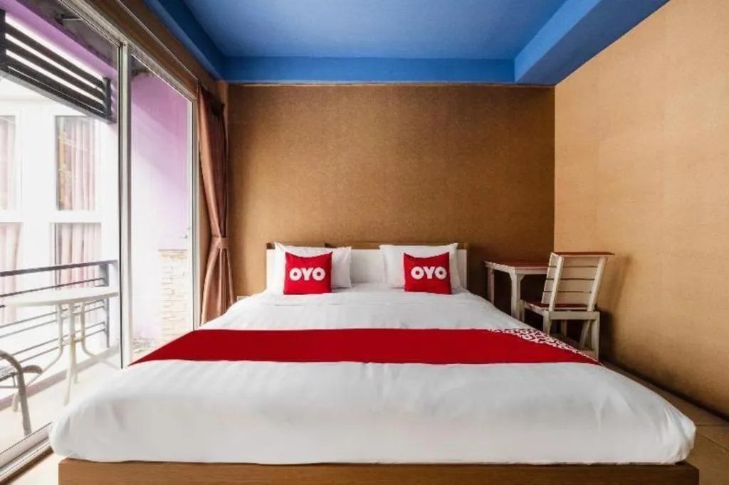 Bed in OYO 826 Cozy Rooms