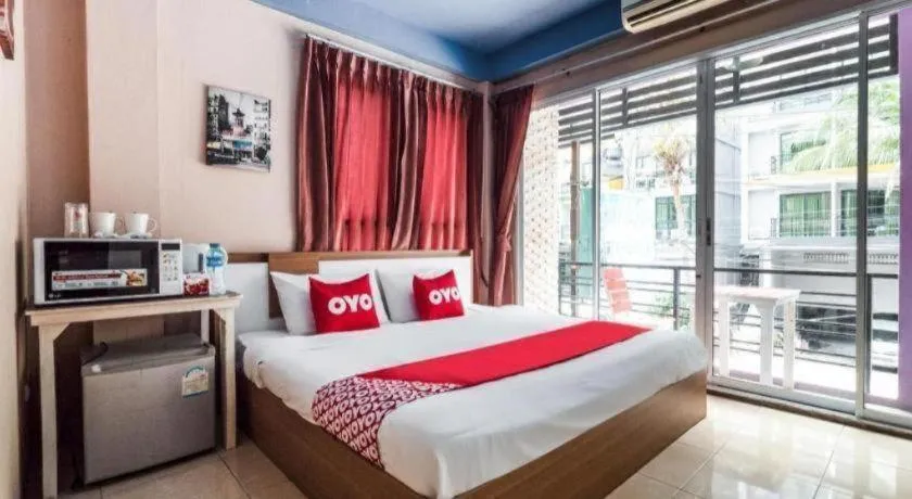 Bed in OYO 826 Cozy Rooms