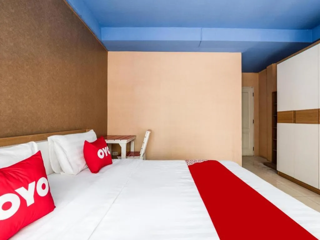 Bed in OYO 826 Cozy Rooms