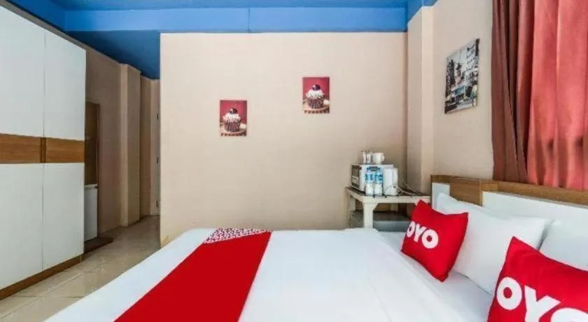 Bed in OYO 826 Cozy Rooms