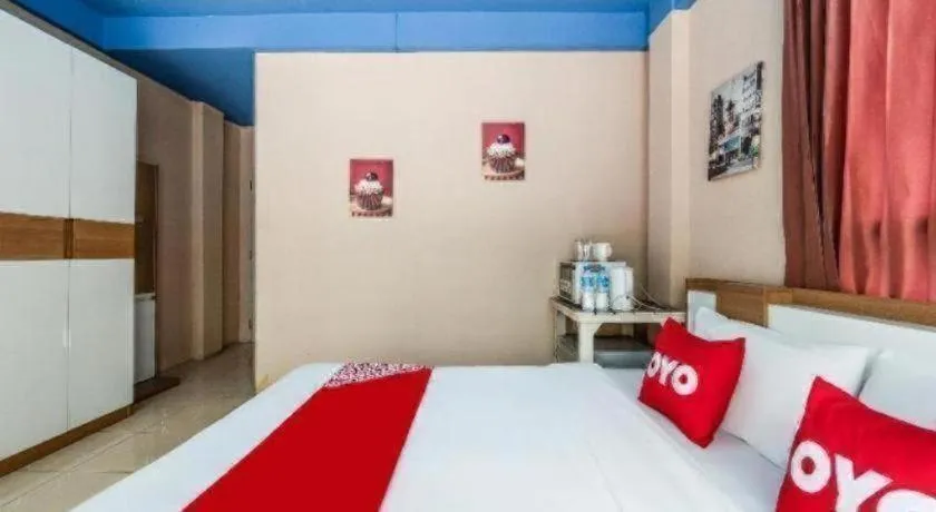 Bed in OYO 826 Cozy Rooms