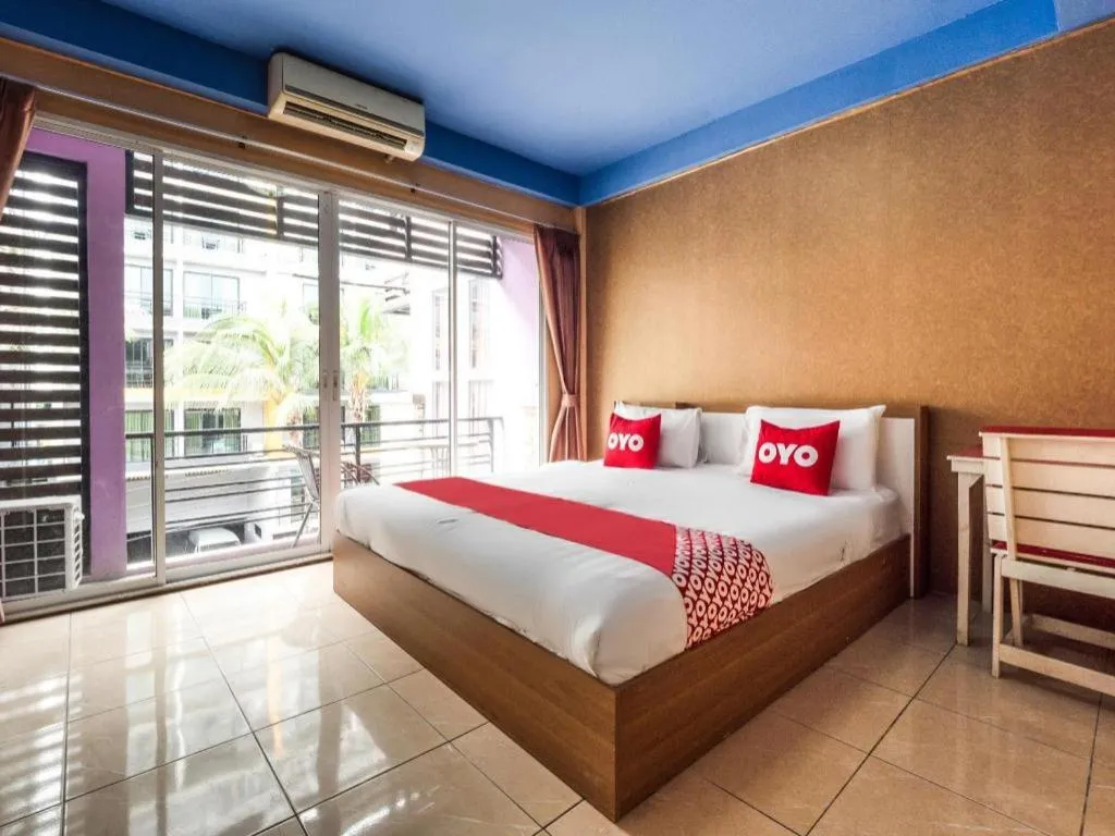 Bed in OYO 826 Cozy Rooms