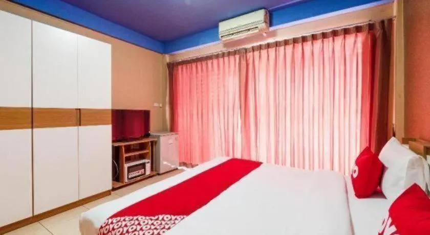 Bed in OYO 826 Cozy Rooms