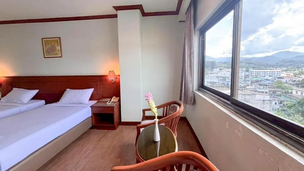 Bed in Sri Betong Hotel