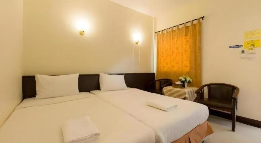 Bed in Kiang Talay Resort