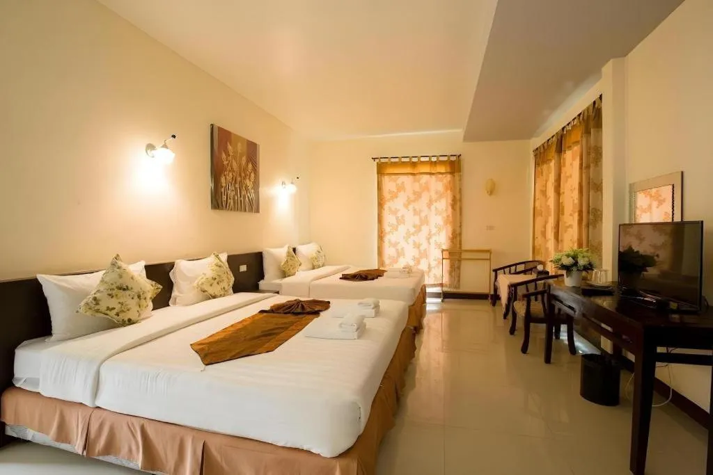 Bed in Kiang Talay Resort