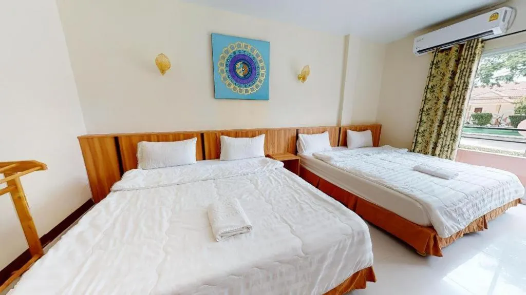 Bed in Kiang Talay Resort
