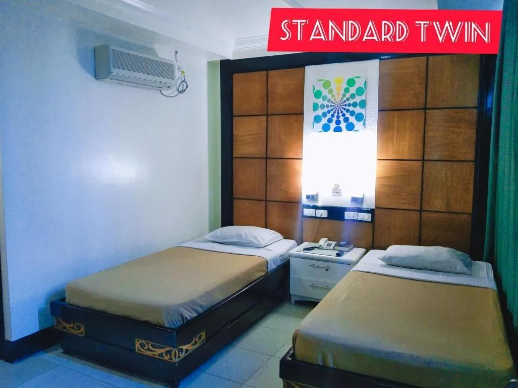 Bed in Marcian Business Hotel