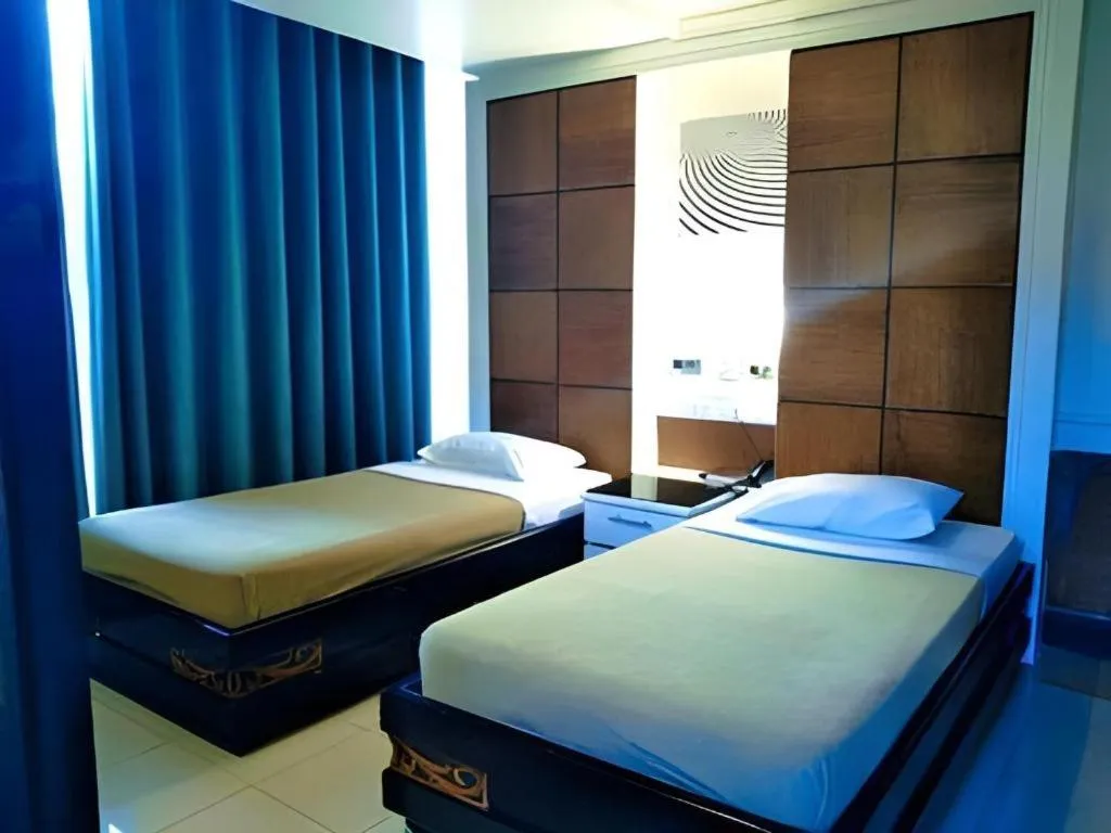 Bed in Marcian Business Hotel