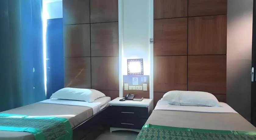 Bed in Marcian Business Hotel