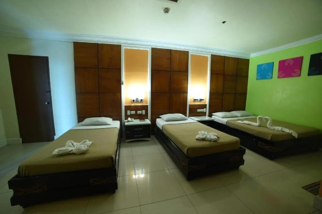 Bed in Marcian Business Hotel