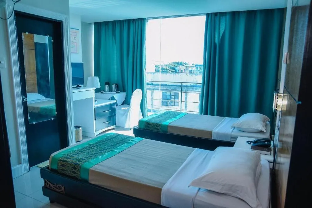 Bed in Marcian Business Hotel