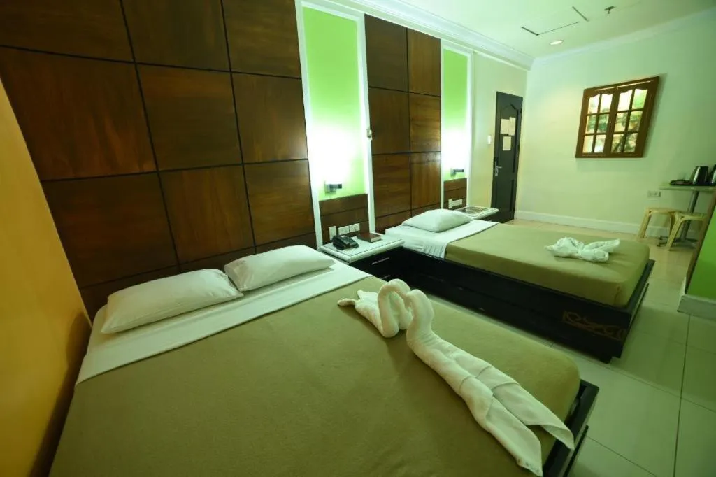 Bed in Marcian Business Hotel