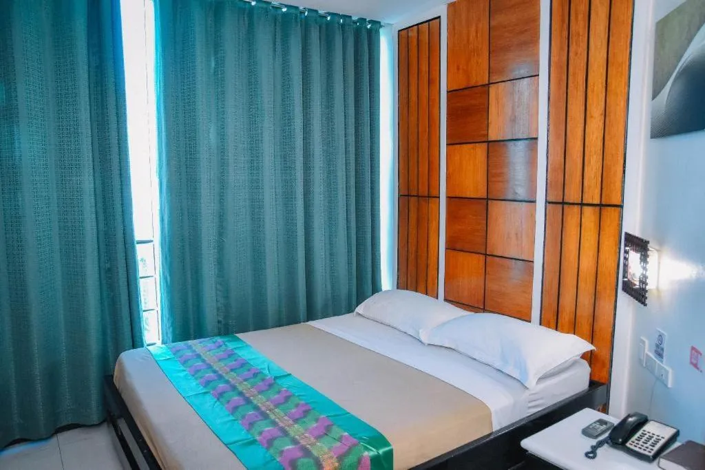 Bed in Marcian Business Hotel