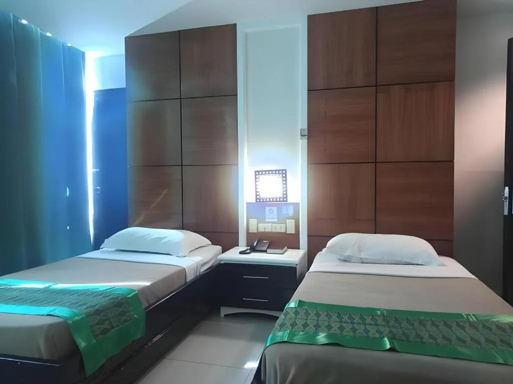 Bed in Marcian Business Hotel