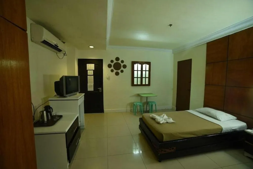 Bed in Marcian Business Hotel