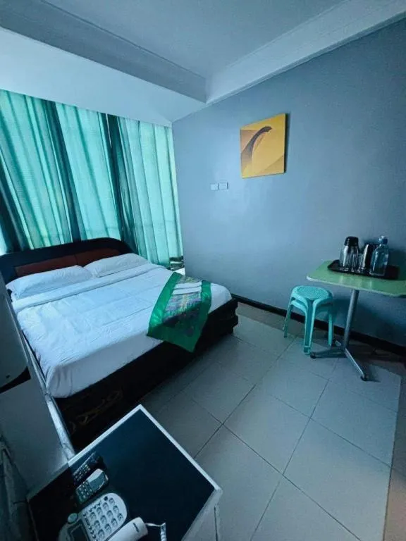 Bed in Marcian Business Hotel