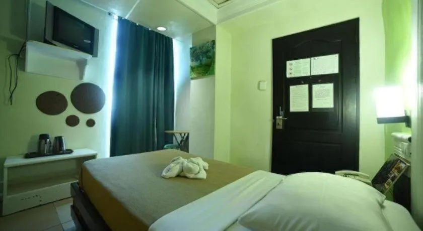 Bed in Marcian Business Hotel