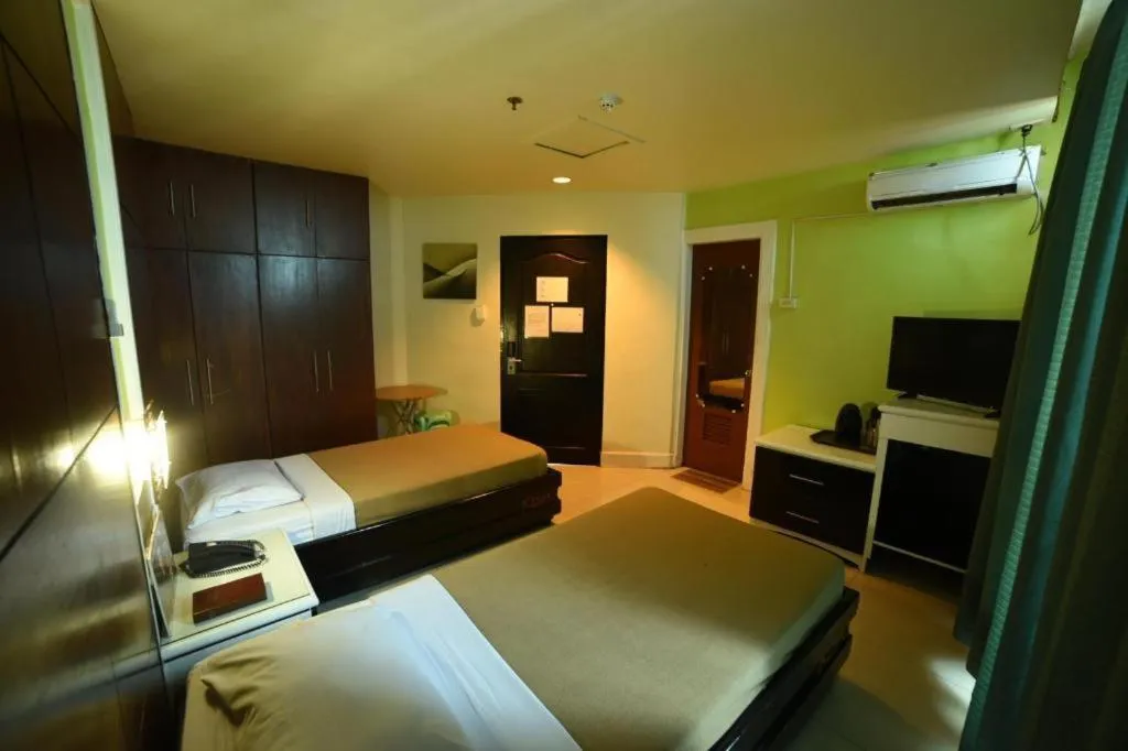 Bed in Marcian Business Hotel