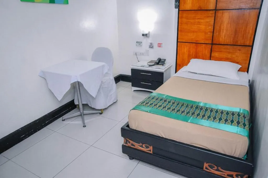 Bed in Marcian Business Hotel