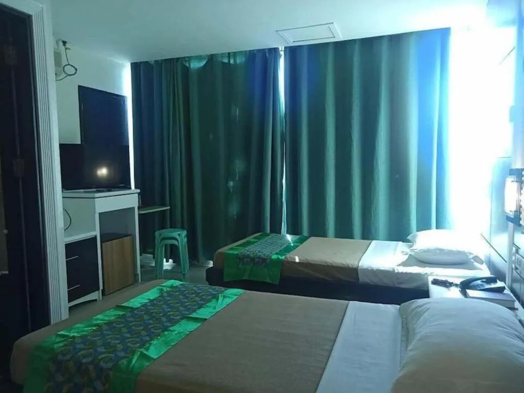 Bed in Marcian Business Hotel