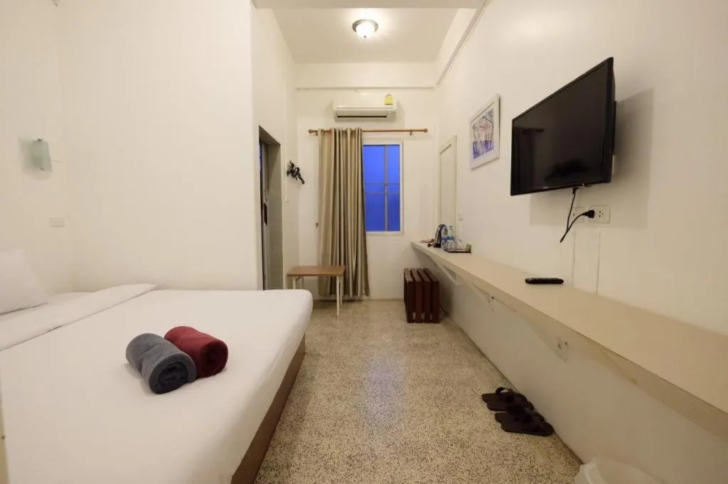 Bed in Chiang Rai Hotel